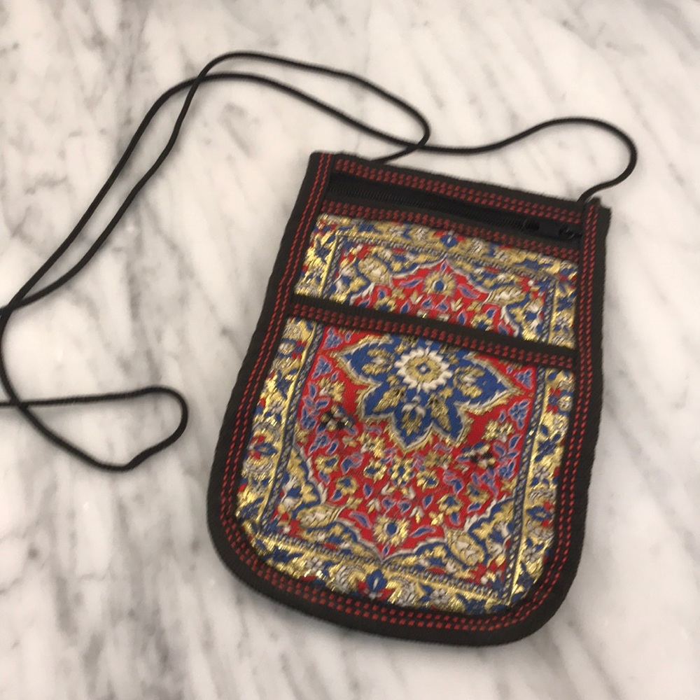 Extremely light cross body bag. Holds all you need